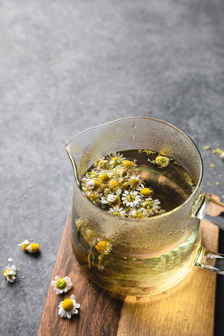 Chamomile tea in a teapot