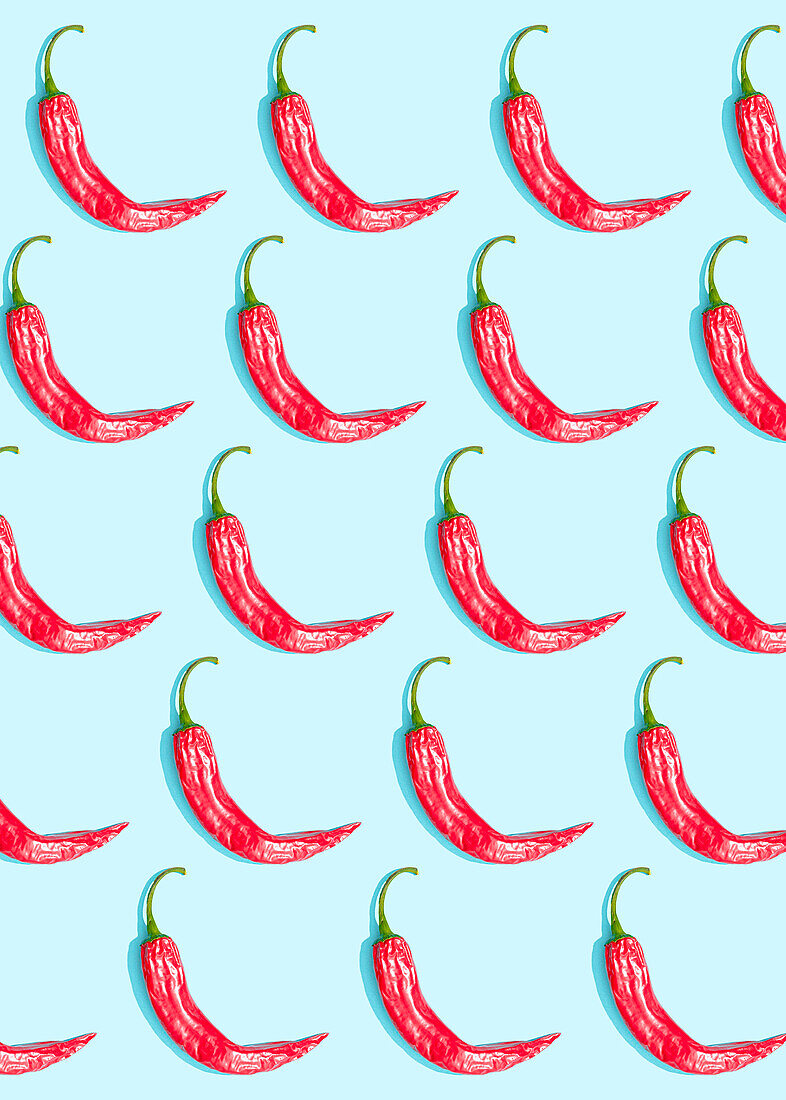 Chilli pepper pattern on a blue background