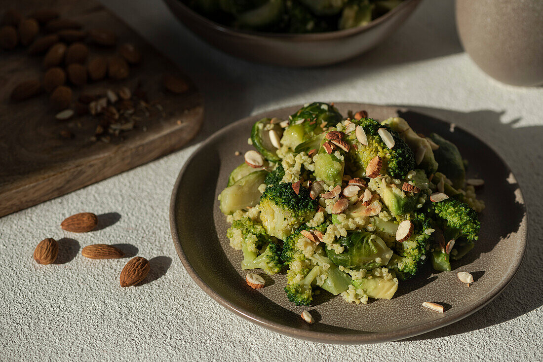 The warm salad of broccoli, Brussels sprouts and avocado with almonds