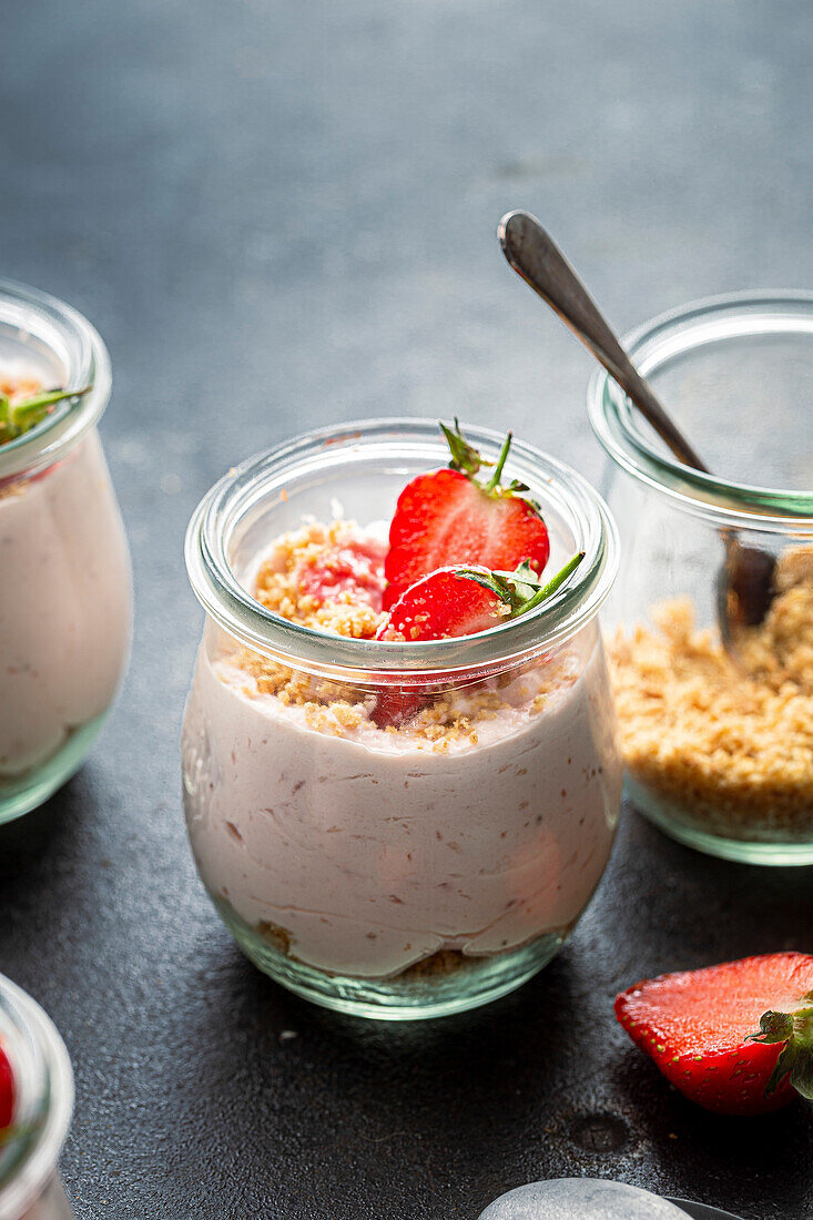 Unbaked strawberry cheesecake jars