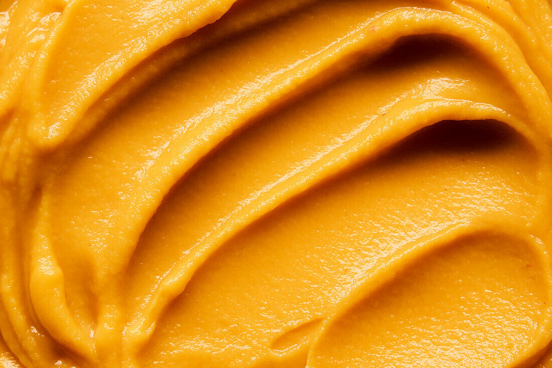 Swirl of pumpkin puree close-up