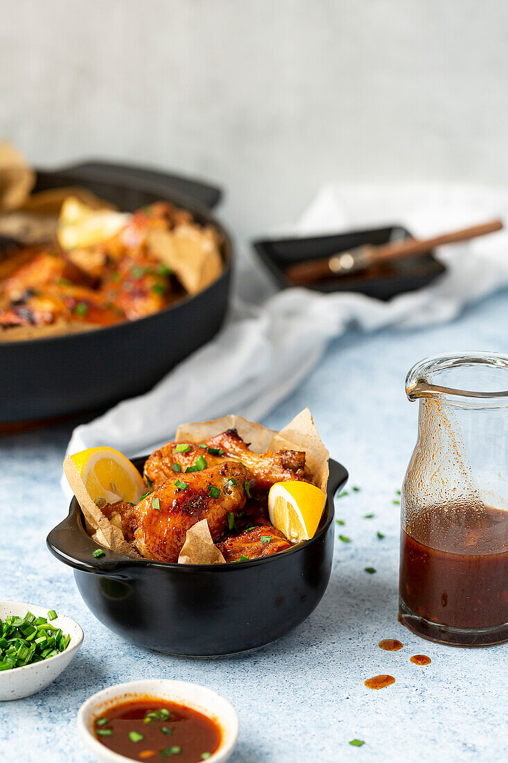 Maple Soy Chicken Nibbles in a black bowl