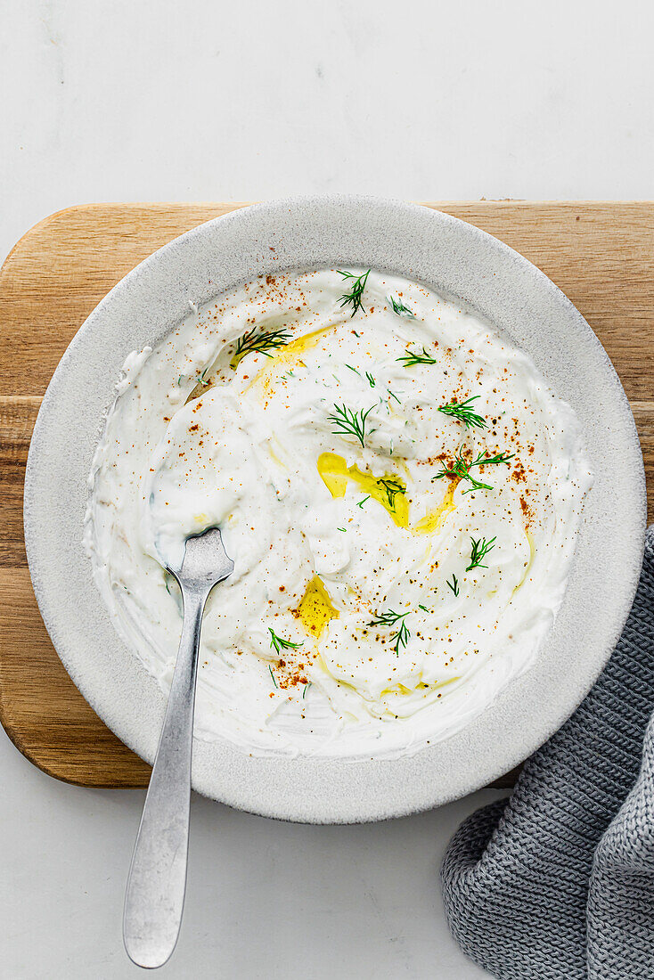 Bowl with yoghurt and garlic sauce