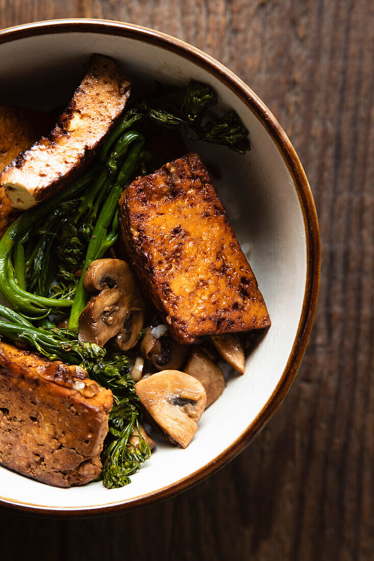 Soy tofu with tenderstem broccoli, mushrooms and rice.