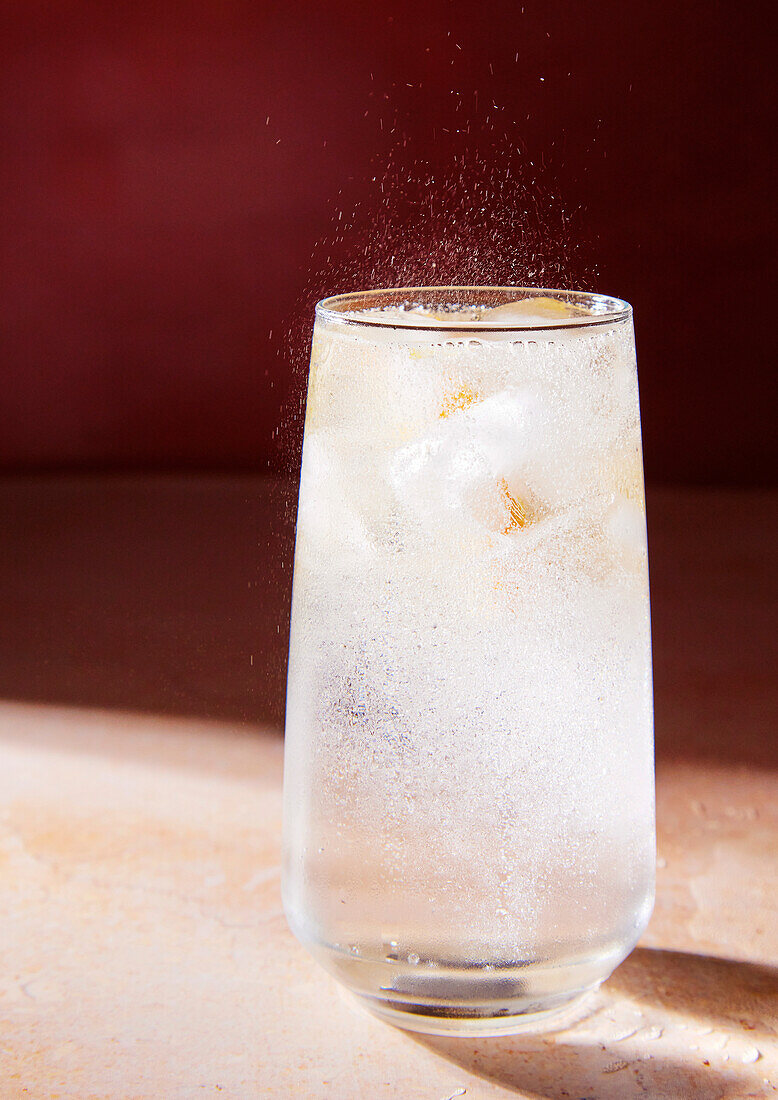 Lemonade in a glass with fizzy bubbles