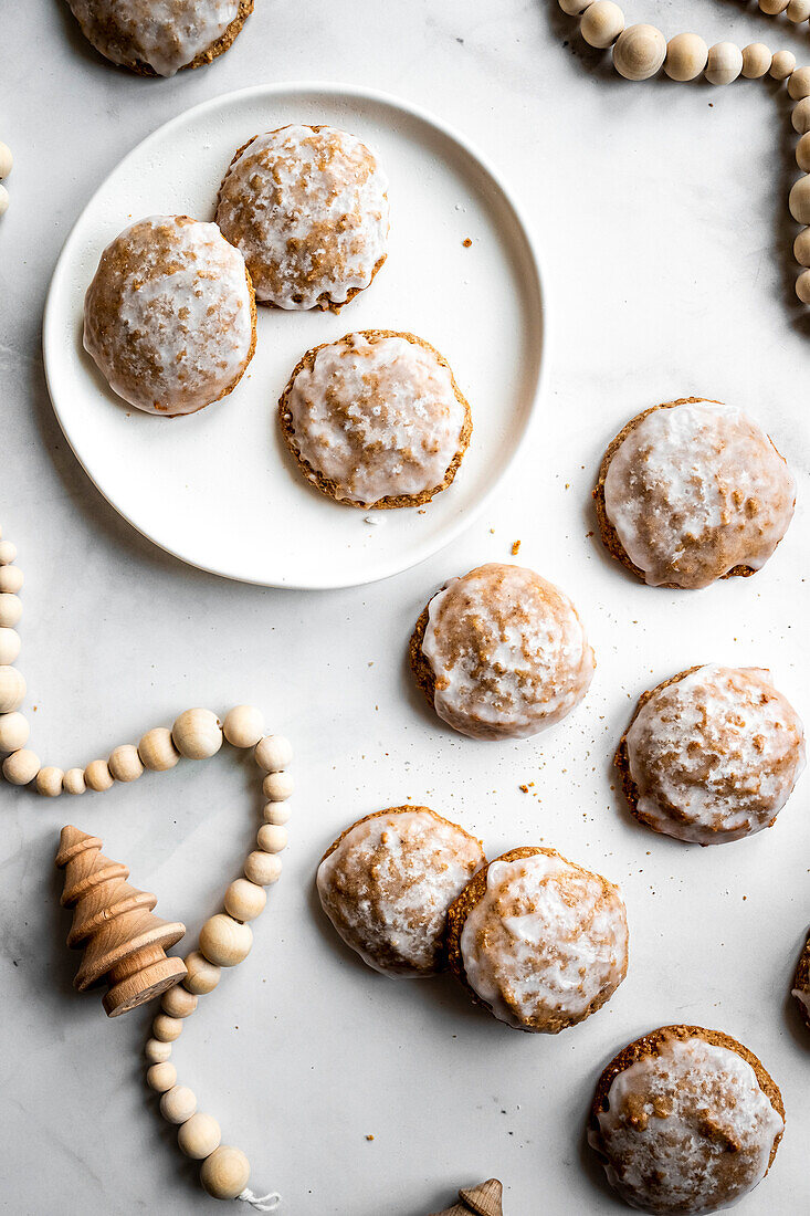 German gingerbread on a marble platter with Christmas decorations