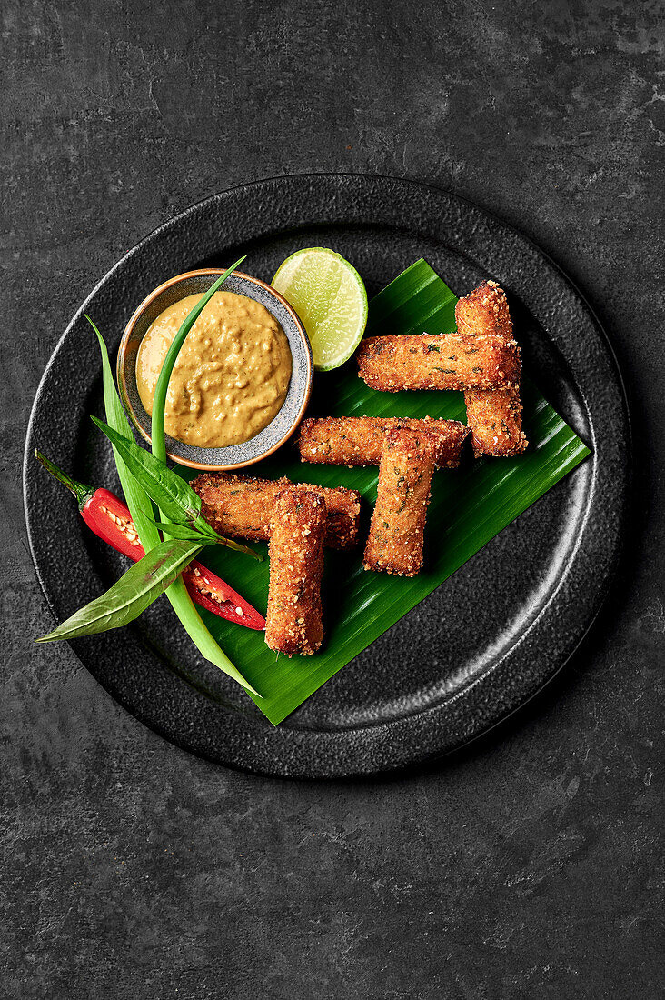 Thai-style crab sticks with spicy peanut dipping sauce
