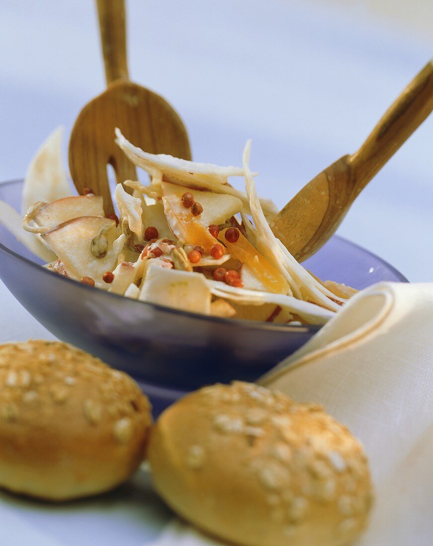 Celeriac salad with apple, apricots and pink pepper