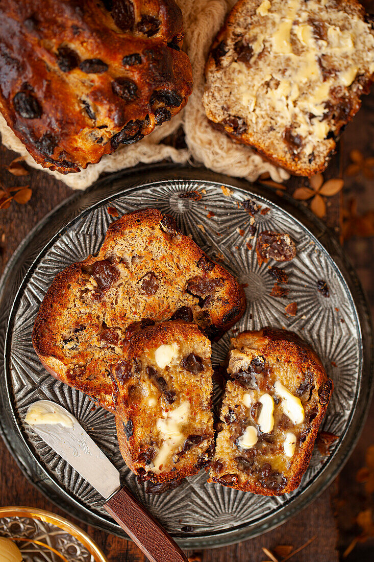 Toasted Fruit Bread covered in butter