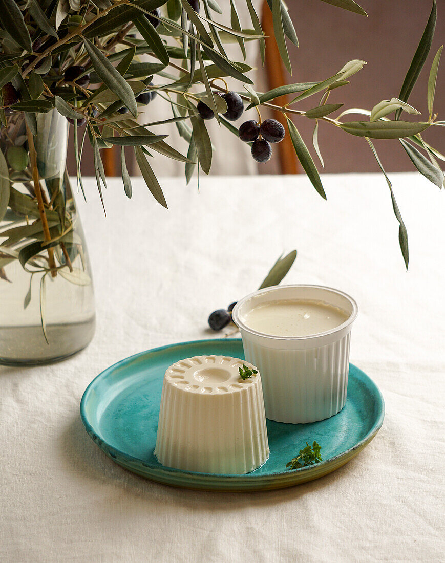 Fresh cheese from Burgos, Spanish white cheese. Natural linen tablecloth