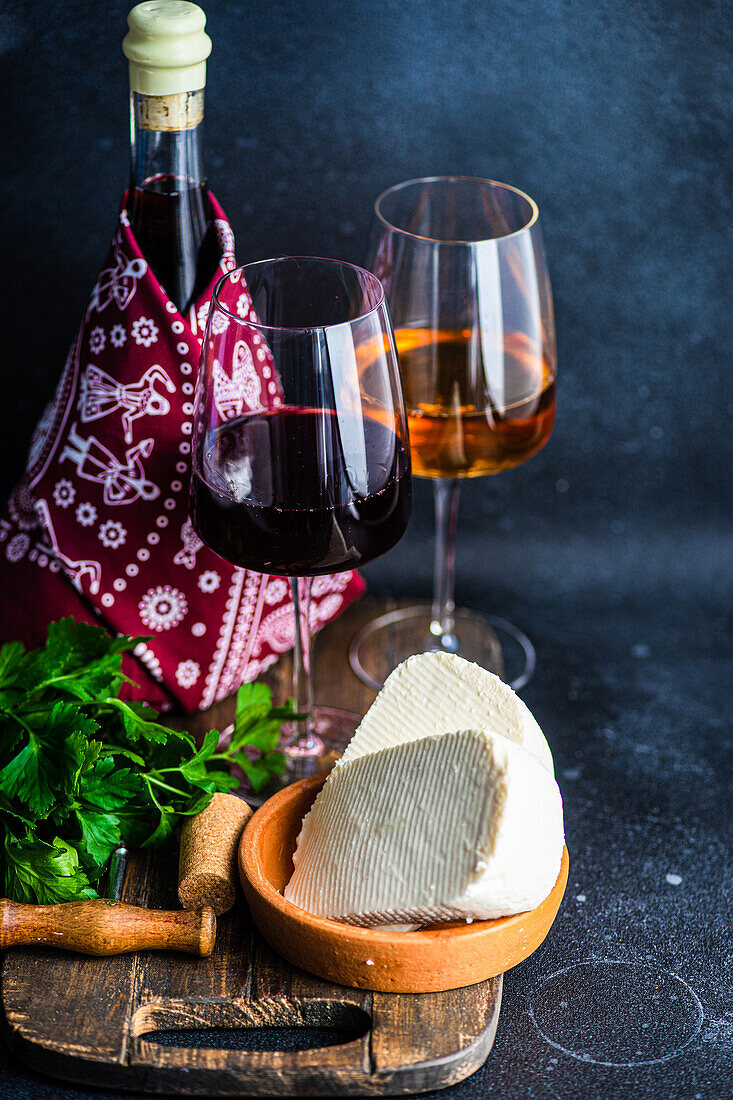 White and red Georgian wine in the glasses on concrete background