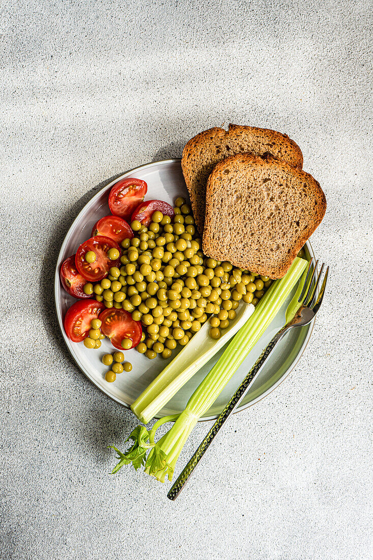 Top view of a raw vegetables in the bowl served on the concrete table