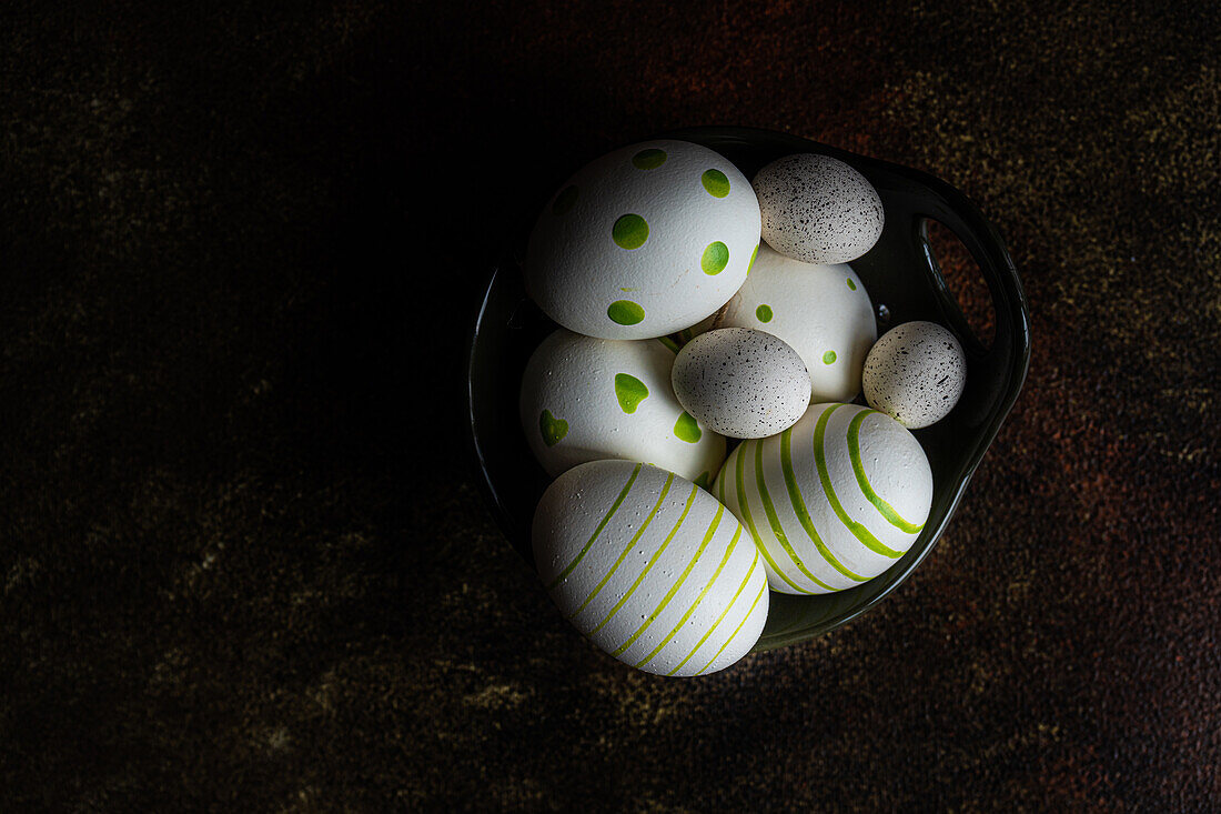 From above basket with easter card concept with eggs on rustic brown background