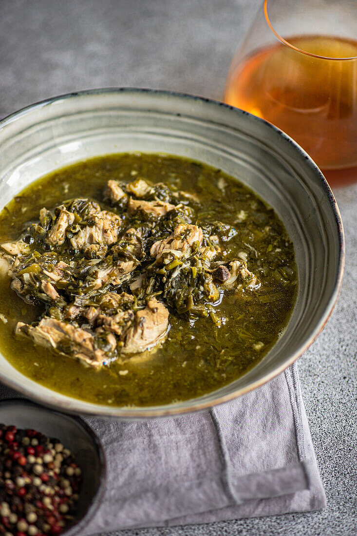 Traditional Georgian seasonal dish Chakapuli served in the bowl