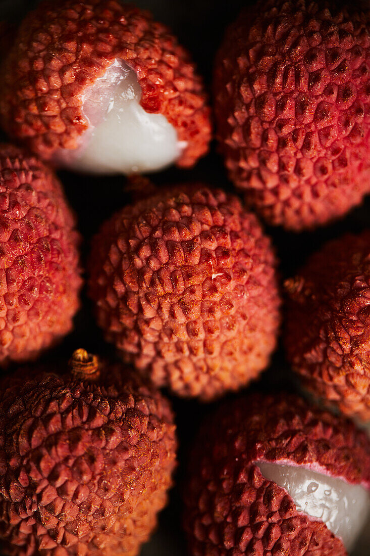 Top view close up of delicious fresh and opened ripe lychee fruits