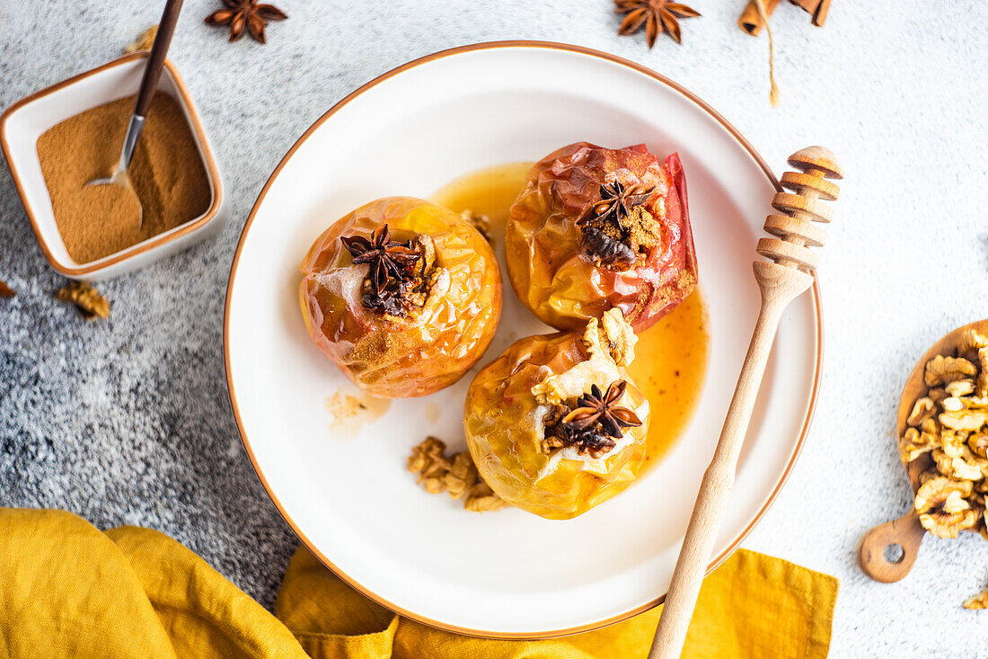 Baked apples with honey and walnuts served with spices