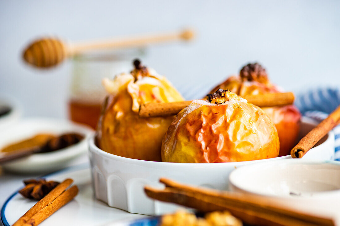 Baked apples with honey and walnuts served with spices