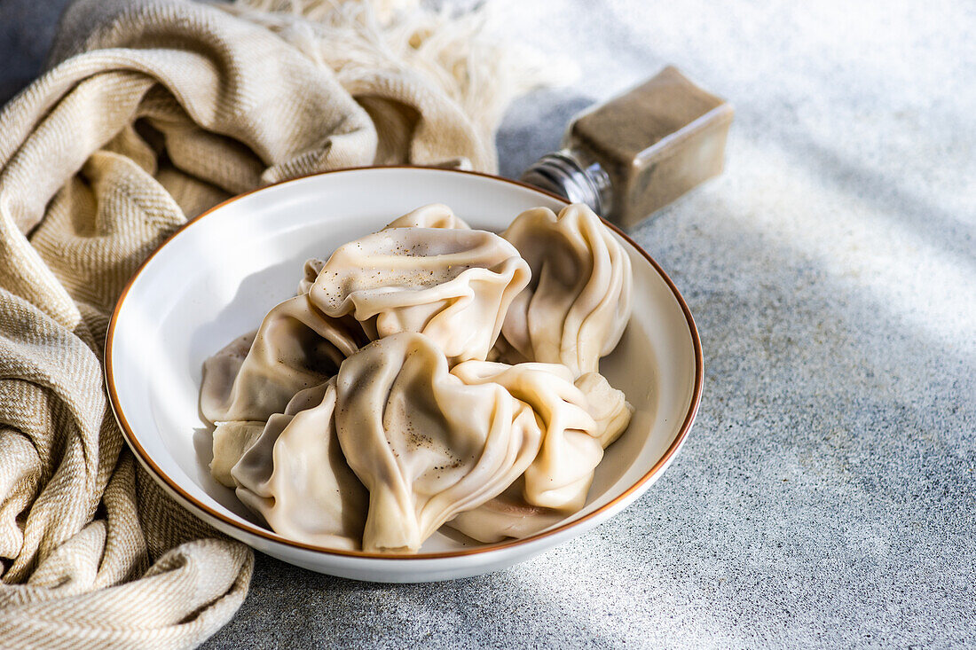 From above fresh boiled traditional Georgian khinkali in the bowl