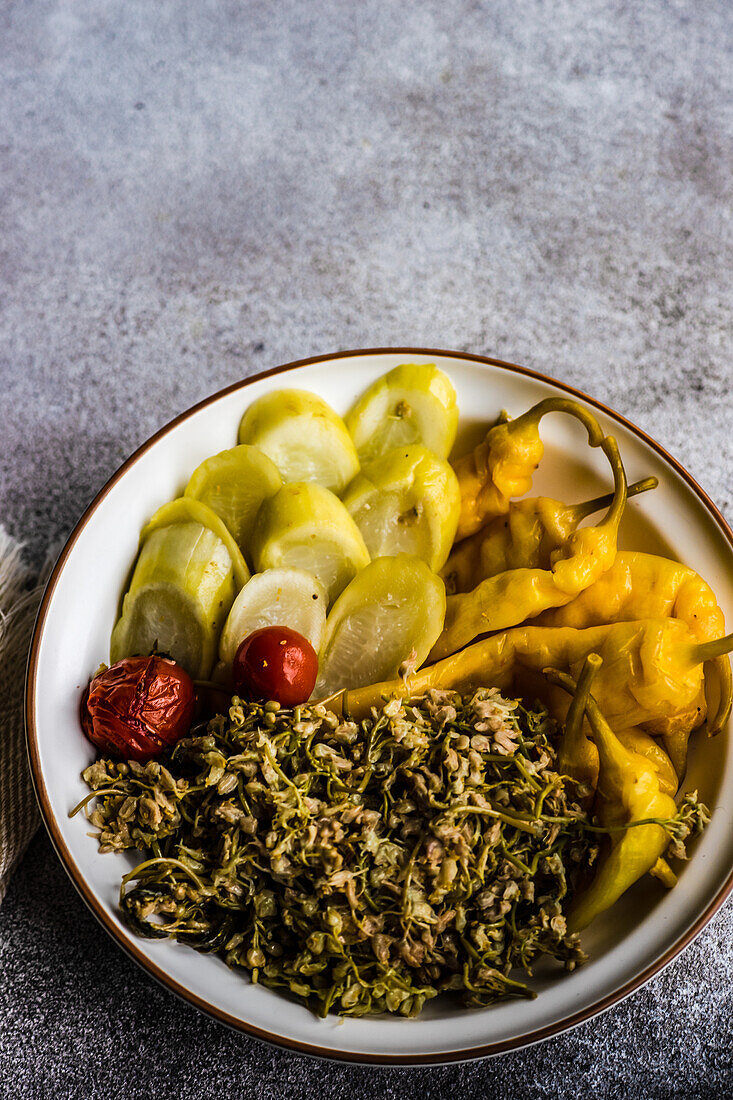 Bowl with Georgian fermented vegetables on the table