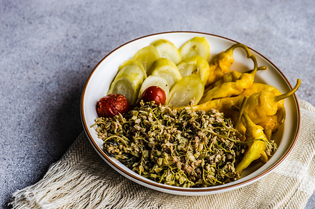 Bowl with Georgian fermented vegetables on the table