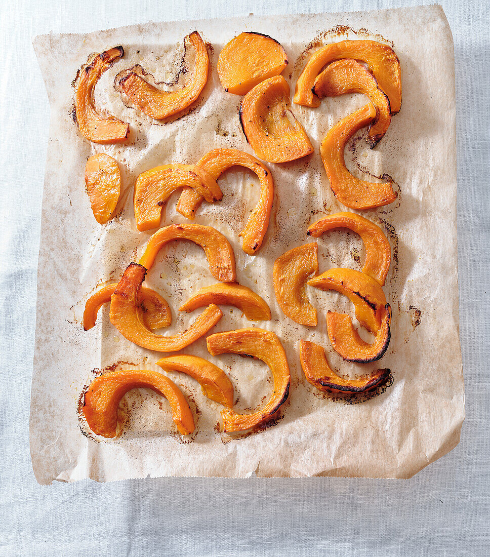 From above a tray with roasted pumpkin