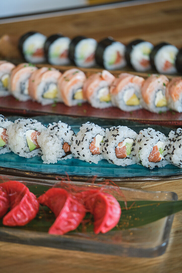 Stock photo of yummy sushi plates in japanese restaurant.