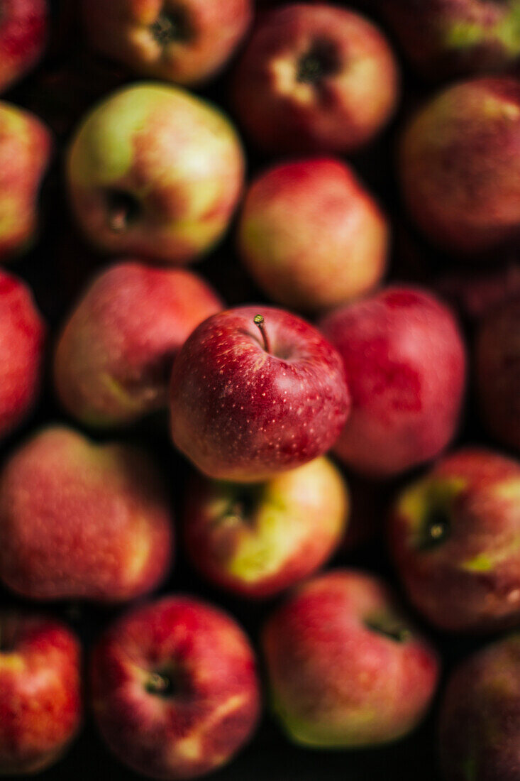 Fresh red apples on dark background
