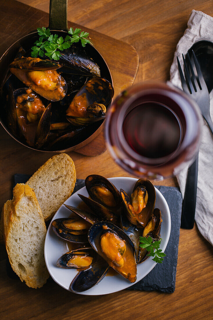 Delectable mussels with herbs in bowl