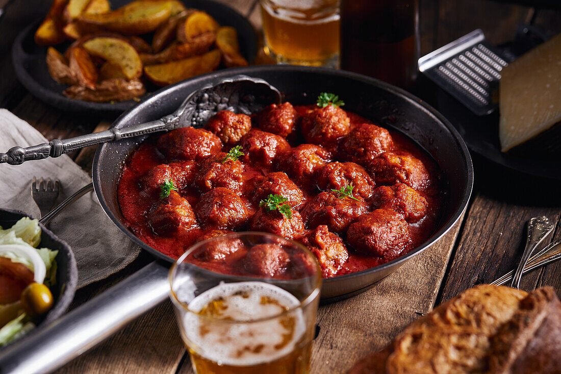 Closeup viewed from above of a plate of meatloaf with tomato