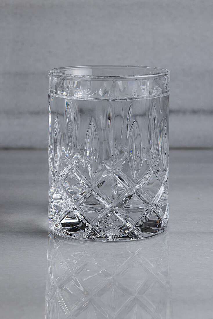 Glass of water on marble board