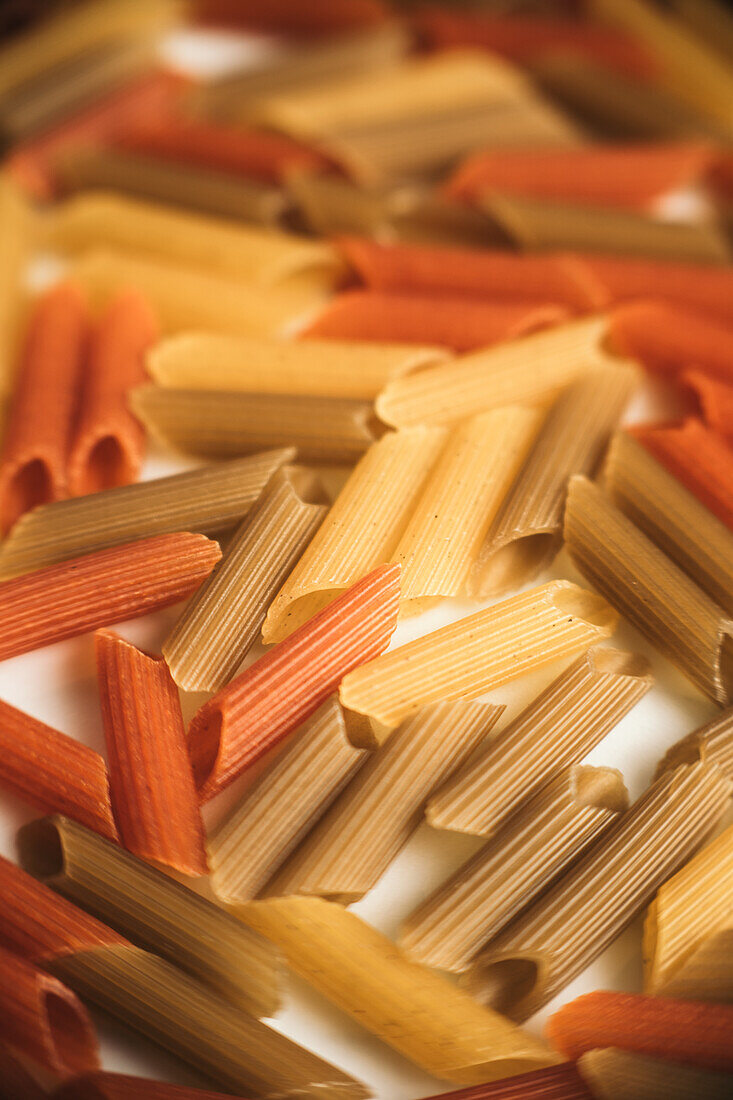 From above assortment of colorful macaroni