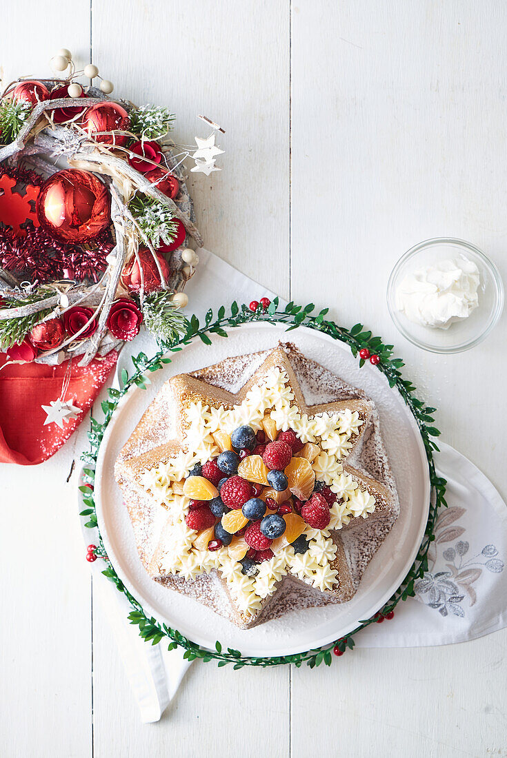 Pandora star with crème anglaise and fruit