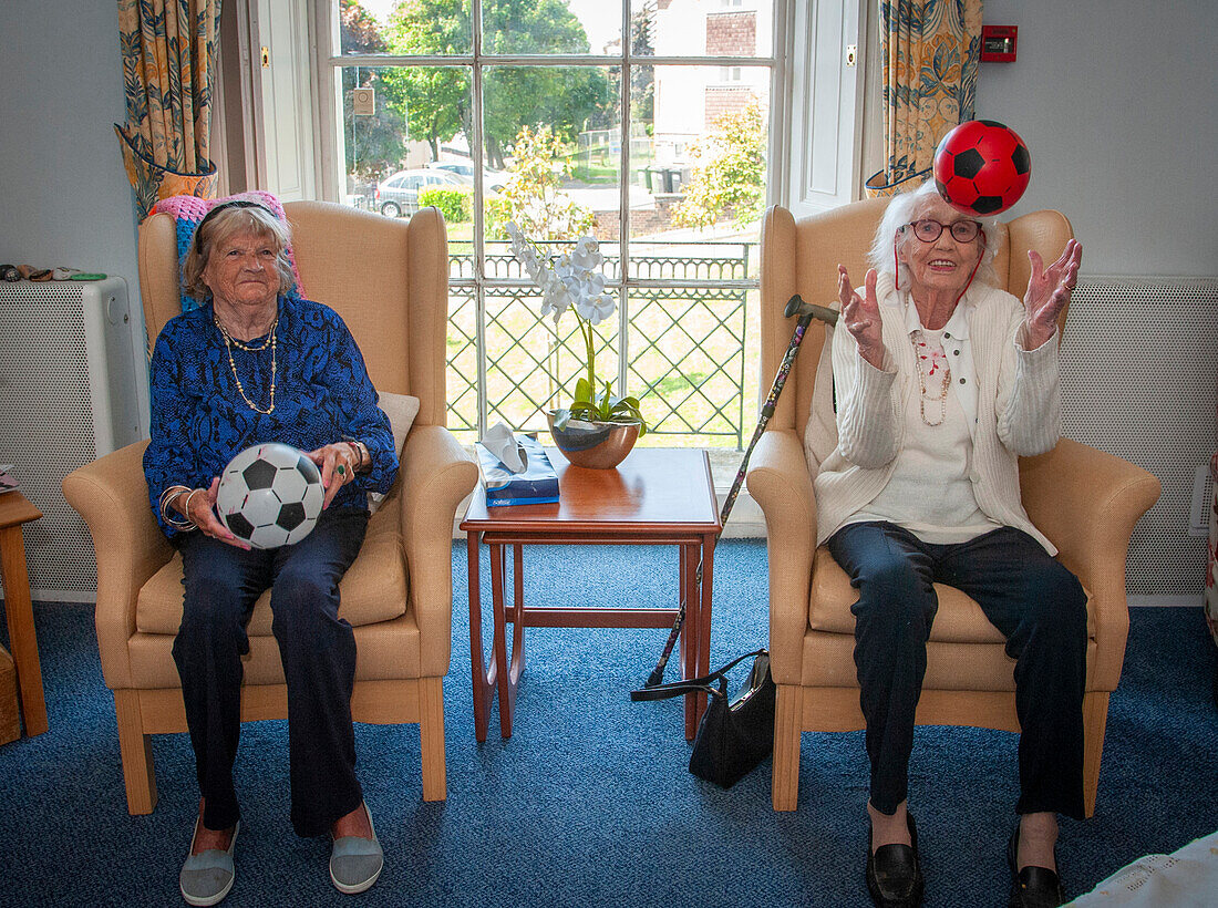 Care home residents taking part in exercise class