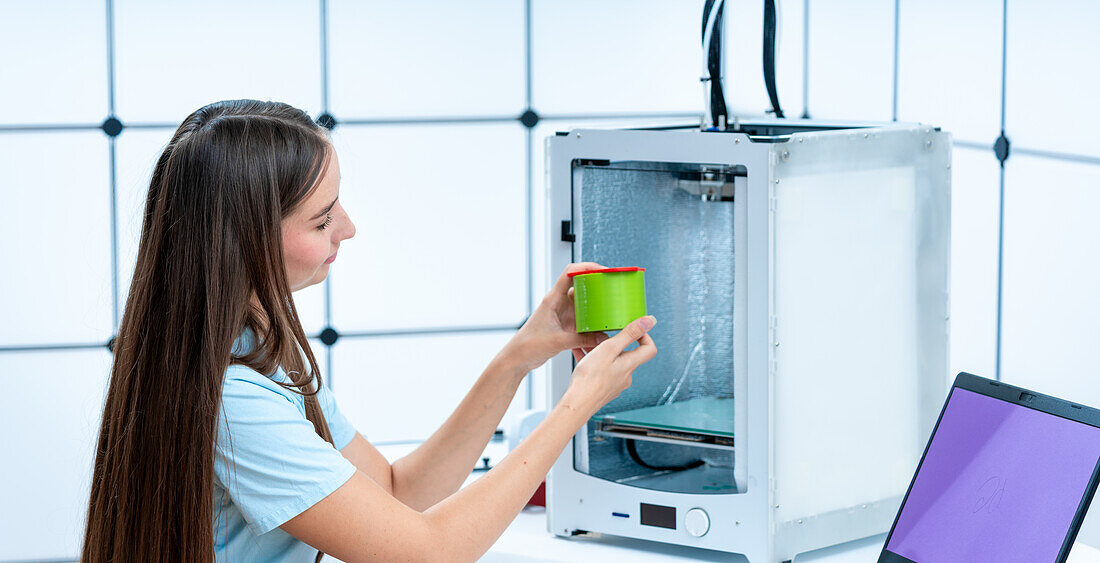 Scientist using 3D printer