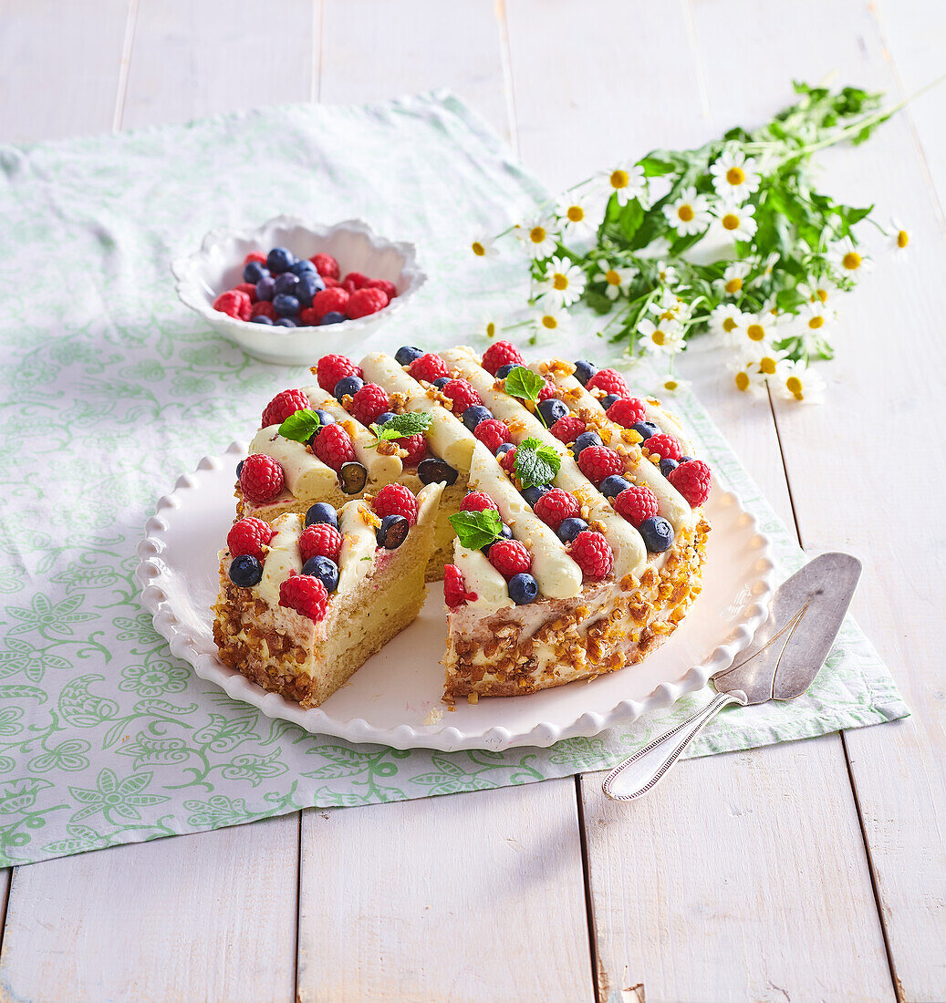 Pistachio cream cake with wild berries