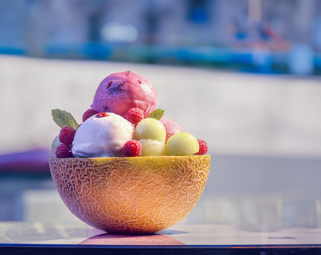 Raspberry and vanilla sorbet served in a melon shell
