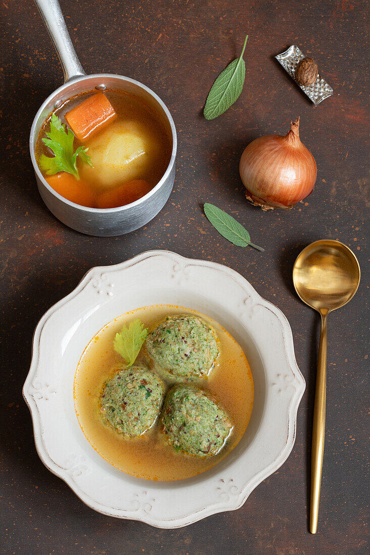 Canederli with spinach and parmesan in vegetable broth
