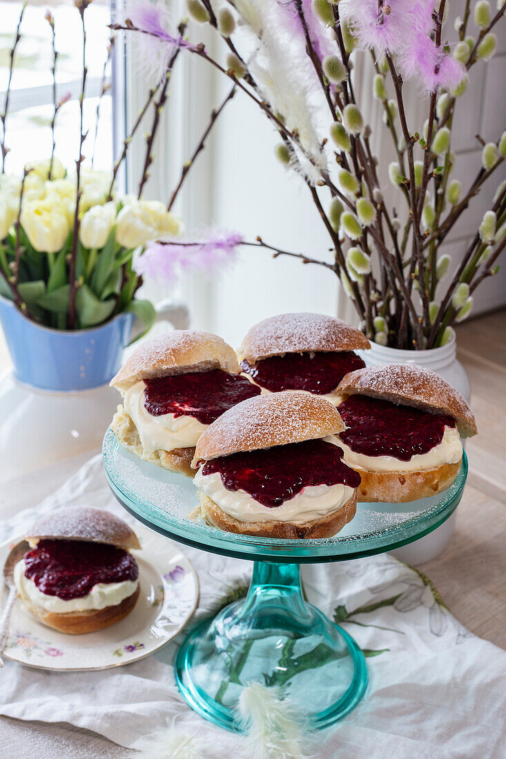 Sweet buns with jam and cream filling