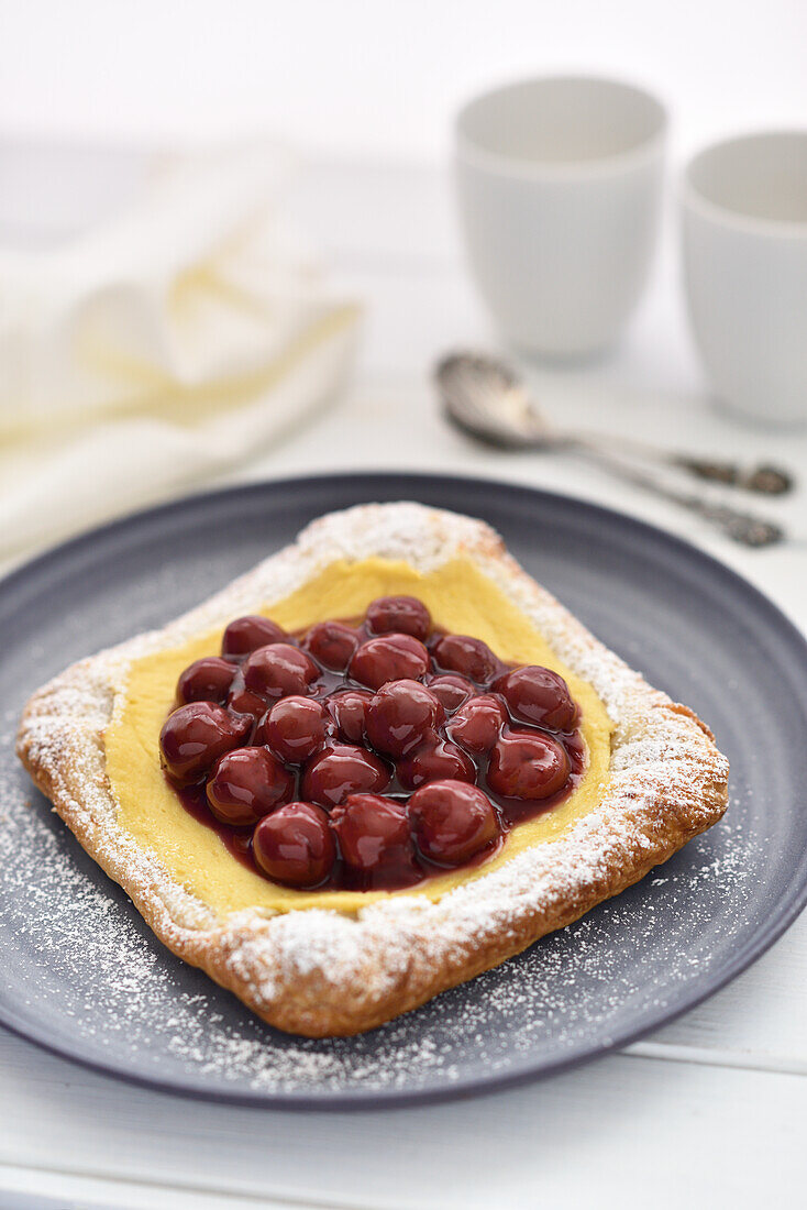 Vanilla custard pastry with cherries