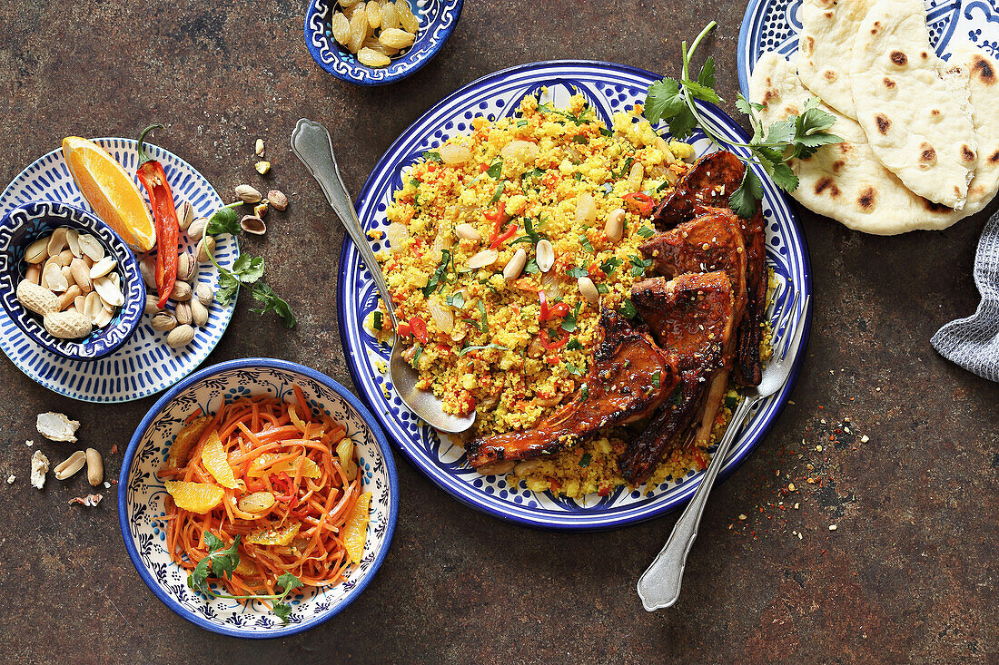 Grilled lamb chops with Moroccan spices, couscous and carrot salad