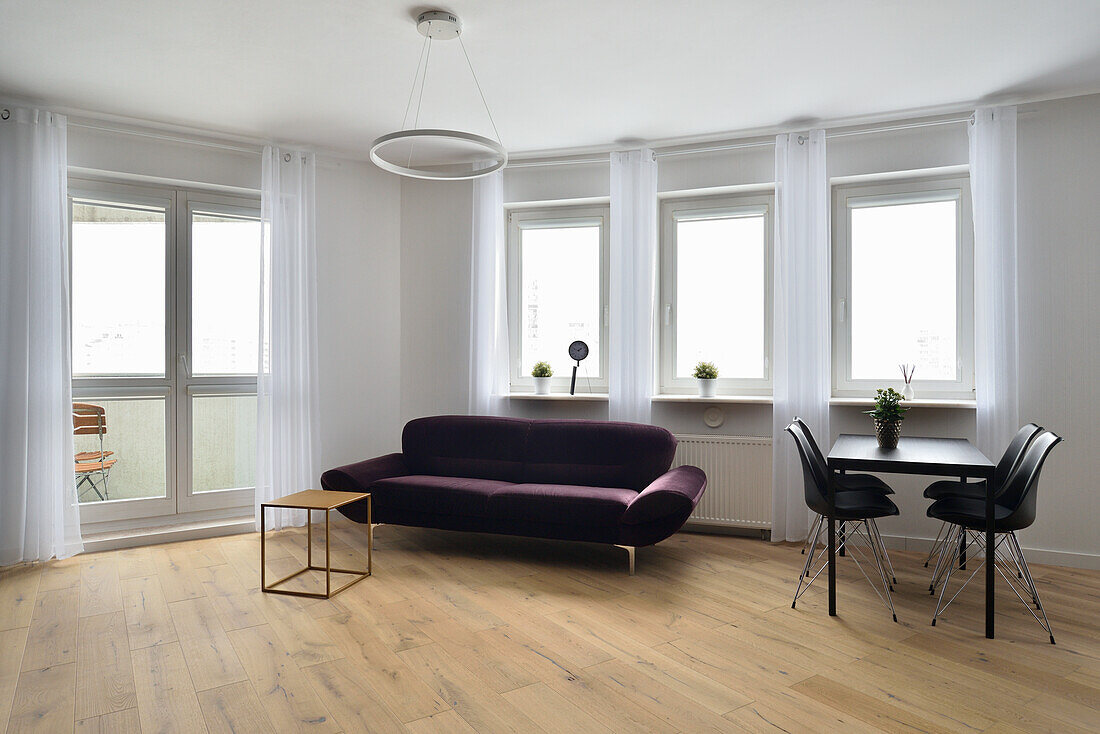 Modern living room with dining area in a flat