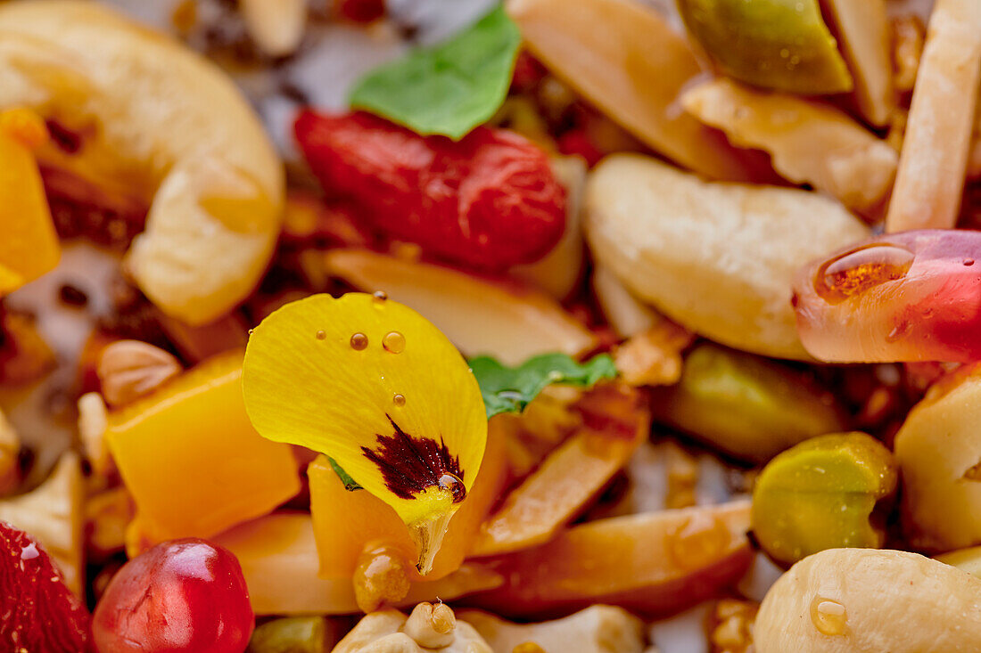 Muesli with pomegranate, mango, pistachios, almonds and goji berries