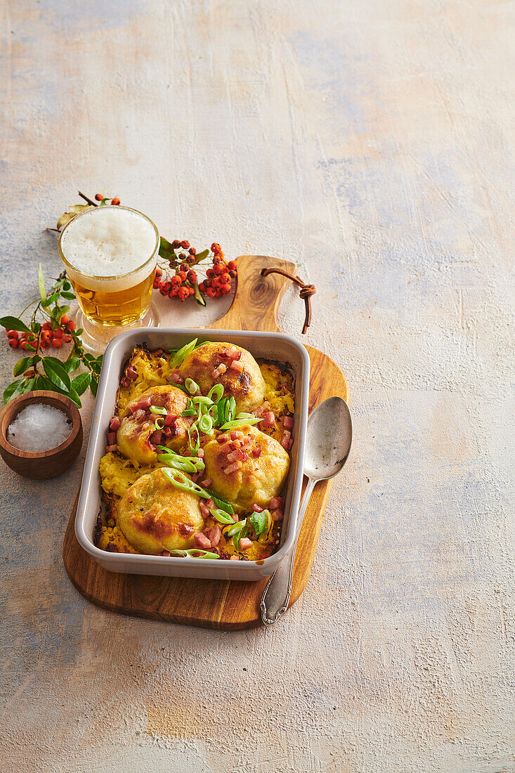 Baked dumplings with smoked pork and sauerkraut