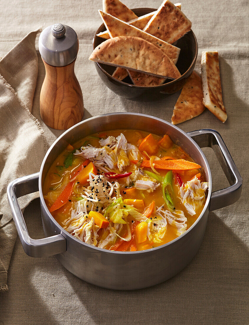 Chicken curry with pumpkin and carrots in the slow cooker