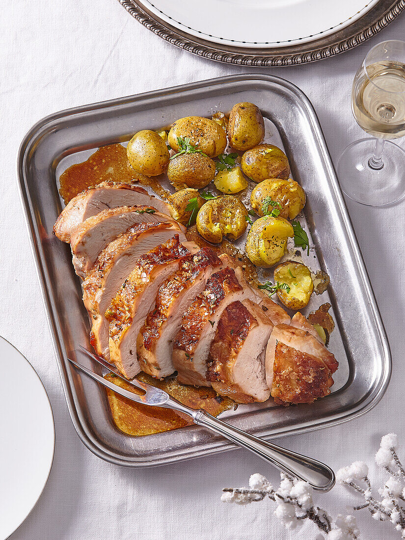 Roasted turkey breast with thyme potatoes and fennel seeds