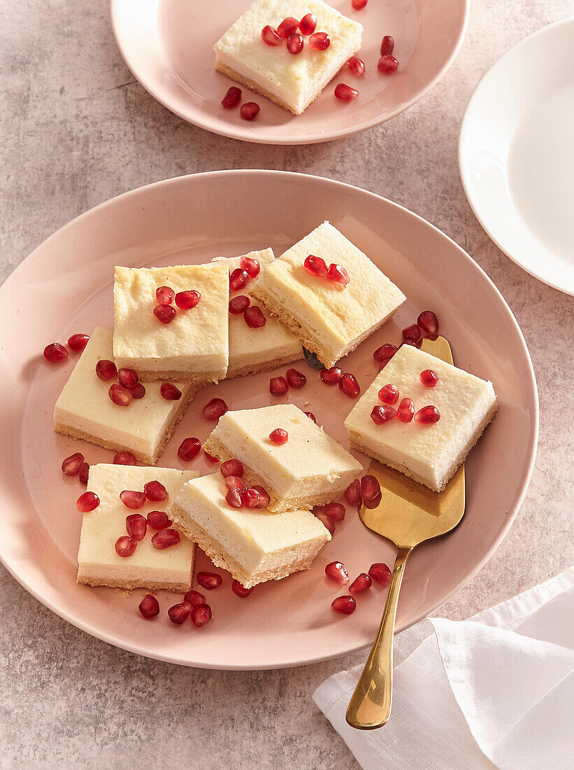 Ricotta slices with pomegranate seeds