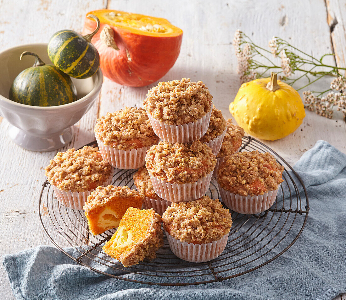 Pumpkin muffins with cream cheese filling and crumbles