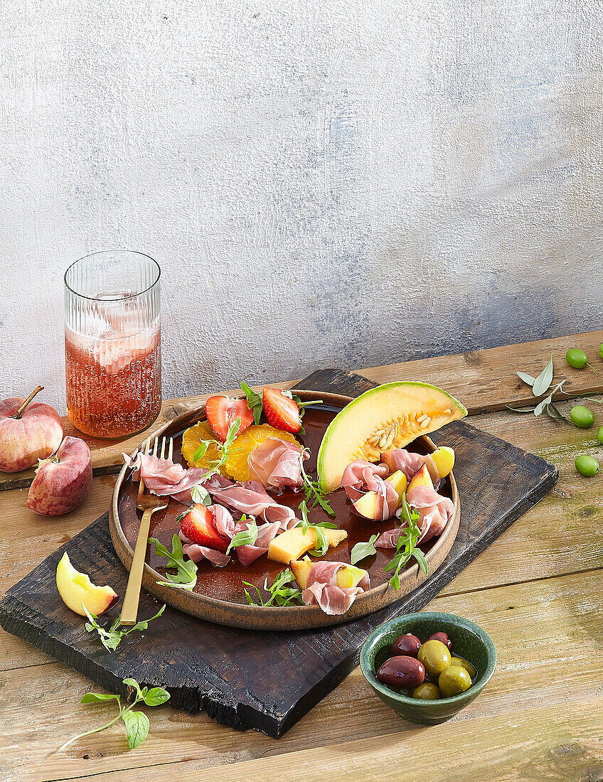 Melon prosciutto salad with nectarines and strawberries