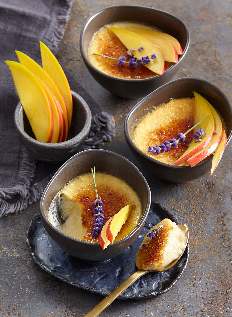 Mango crème brûlée with cardamom and whipped cream