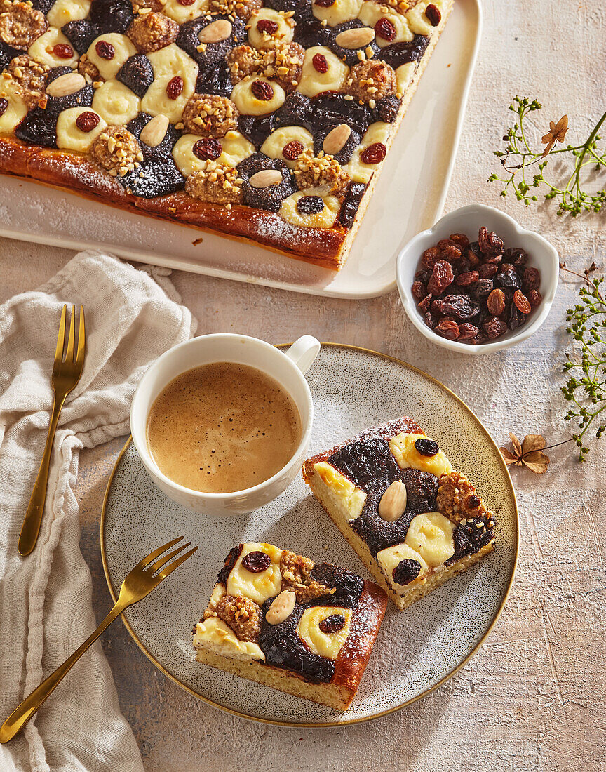 Yeast sheet cake with poppy seeds, plum jam and nuts